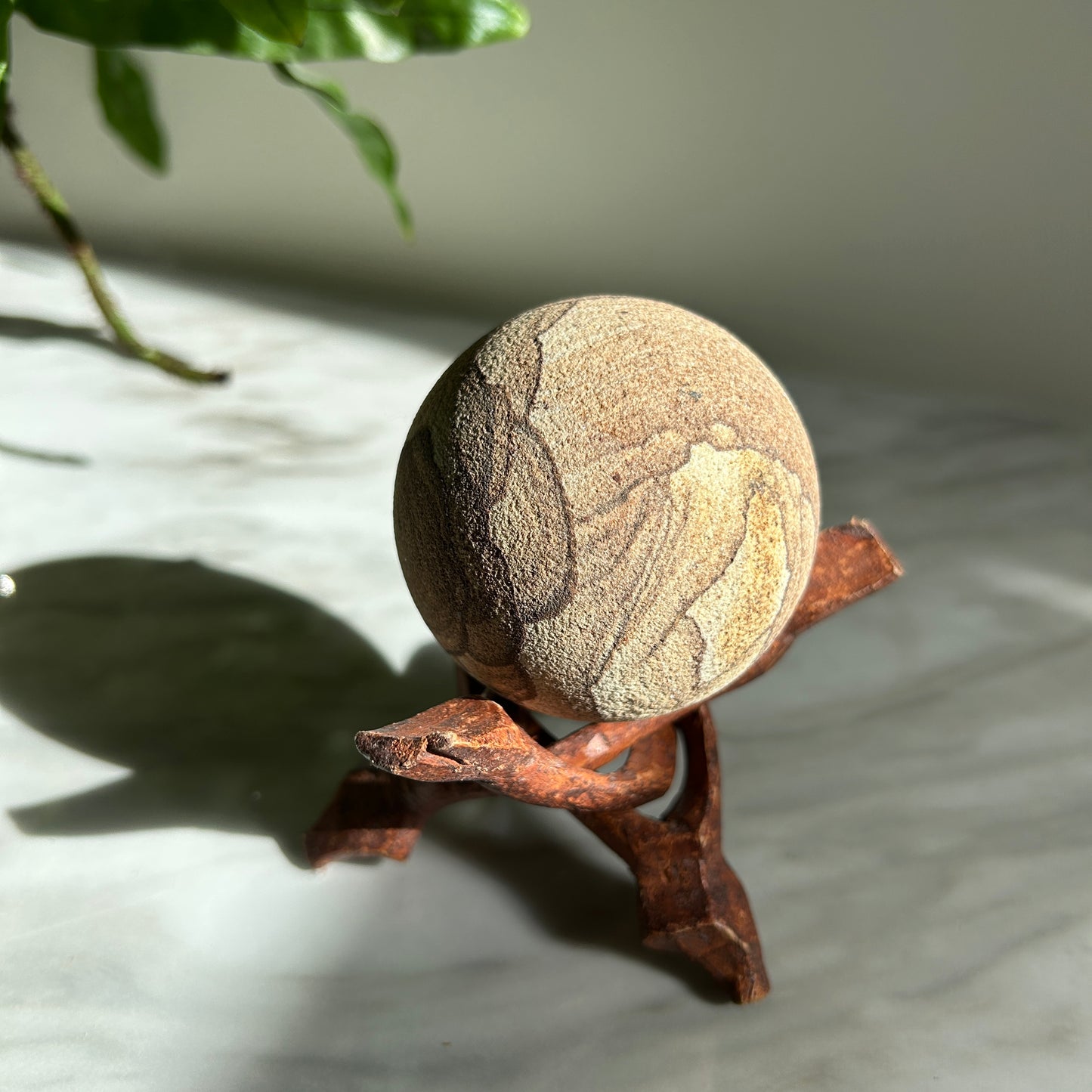 Vintage Sandstone Orb on Carved Wooden Base