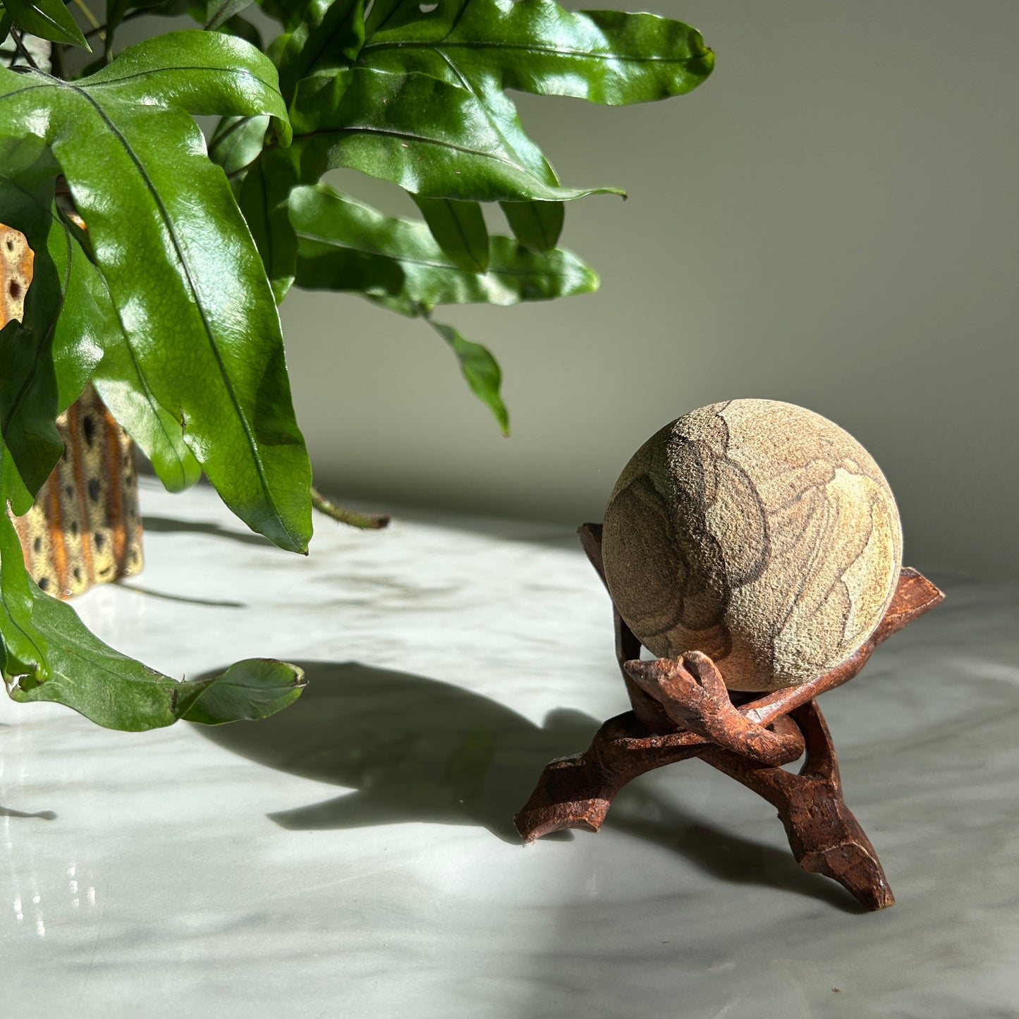Vintage Sandstone Orb on Carved Wooden Base